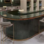 Custom green emerald granite bar top for a sophisticated cocktail lounge.